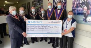 Team Effort From Northumberland Freemasons Hits The Back Of The Net With Charitable Donation