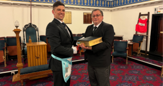 W Bro Shaun Lyons presents Lodge Vandeluer with a special VSL